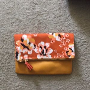 Colorful reversible fold over clutch!